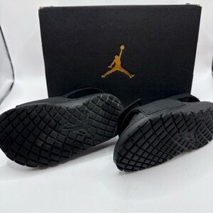 Jordan Hydro 6 slide sandals in a black and hyper pink colorway. Size 7c